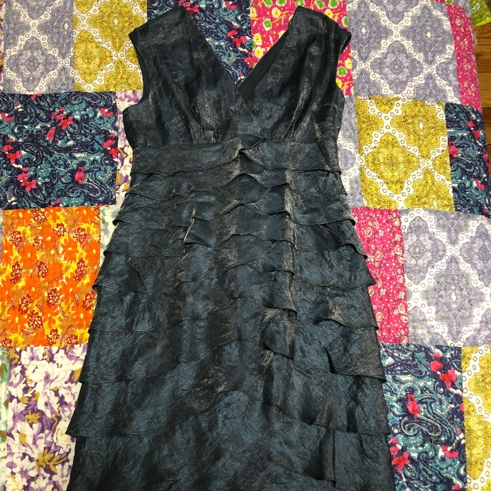 Greyish shiny semi-formal dress.